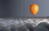 image of a yellow floating balloon 