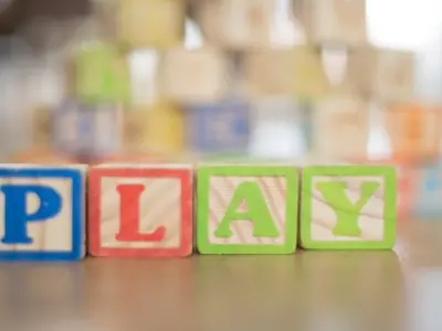 Kids blocks spelling out the word play
